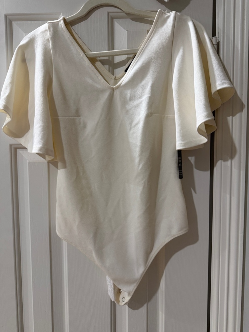 Express Cream V-Neck Flutter Sleeve Bodysuit